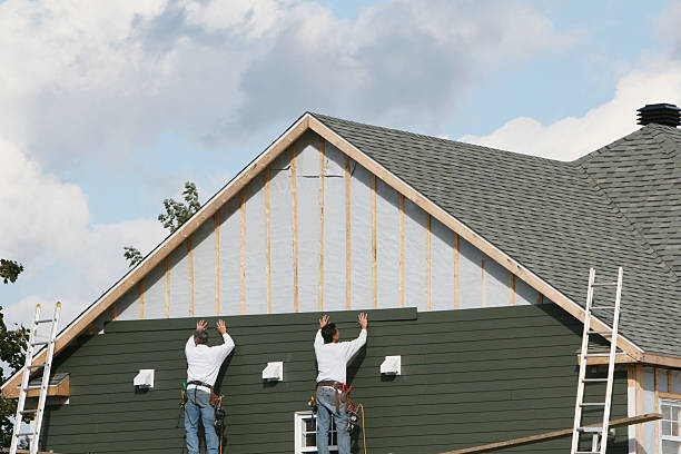 Professional Siding technician working in Worthington, KY